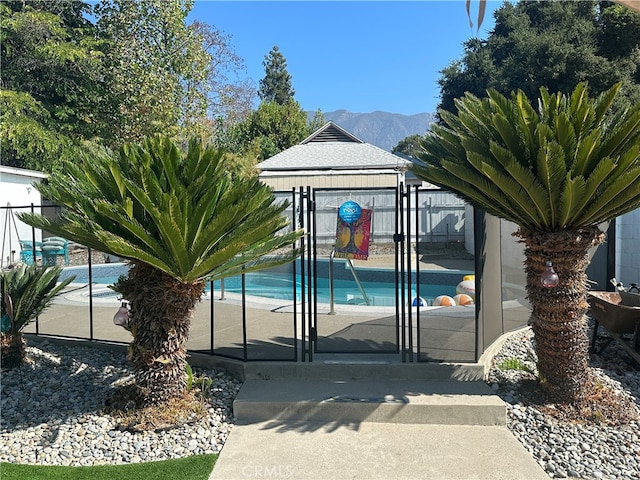 view of pool with a mountain view