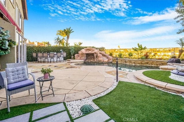 view of patio / terrace featuring an outdoor bar