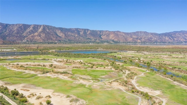 property view of mountains featuring a water view