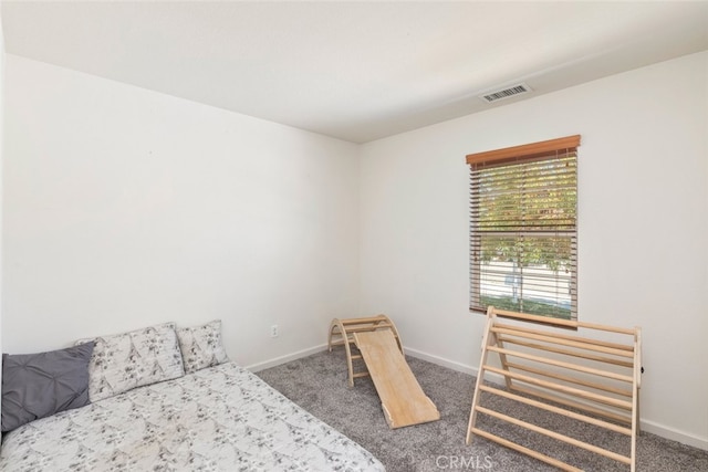 bedroom featuring carpet