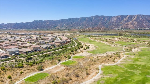 birds eye view of property featuring a mountain view