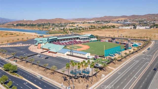 birds eye view of property featuring a mountain view