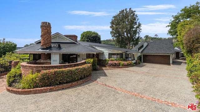 ranch-style home with a garage