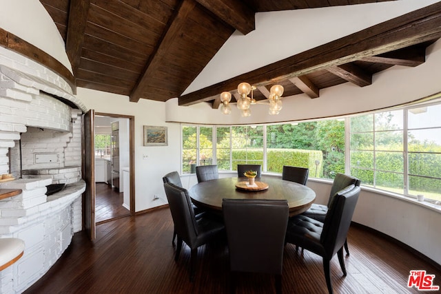 dining room with vaulted ceiling with beams, dark hardwood / wood-style floors, and an inviting chandelier