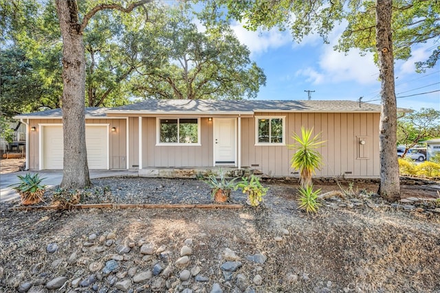 ranch-style home with a garage