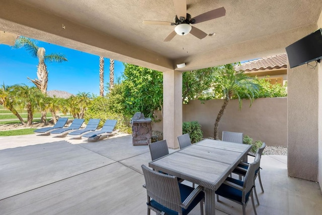 view of patio / terrace featuring ceiling fan