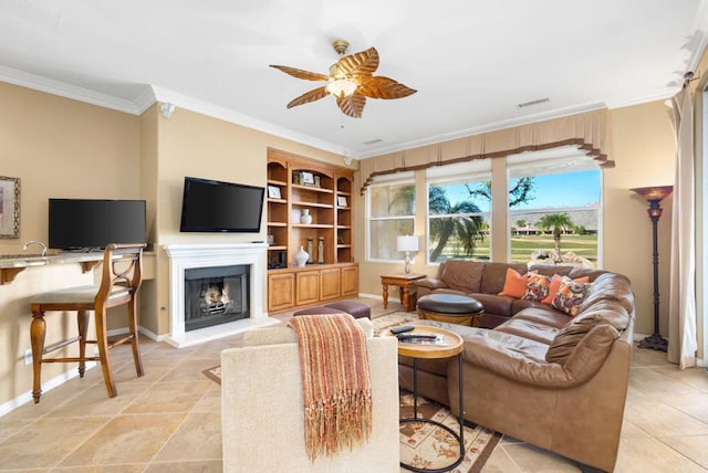 living room featuring ceiling fan, light tile patterned floors, and ornamental molding