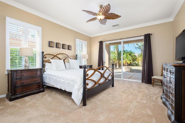 carpeted bedroom featuring multiple windows, crown molding, ceiling fan, and access to exterior