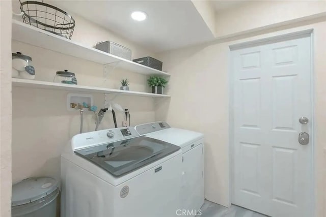 laundry area featuring washing machine and dryer