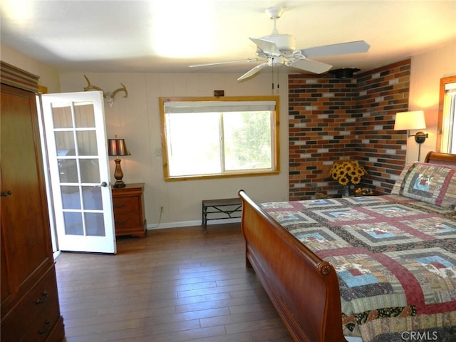 bedroom featuring dark hardwood / wood-style flooring and ceiling fan