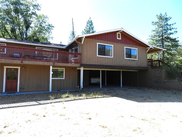 rear view of property with a deck