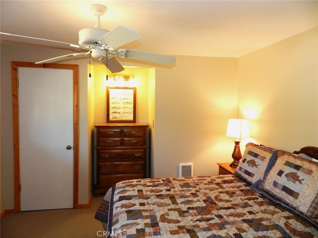 carpeted bedroom featuring ceiling fan