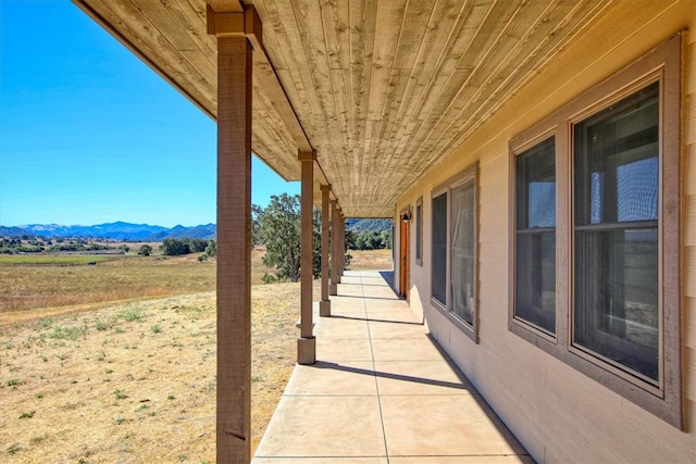 view of patio / terrace with a mountain view