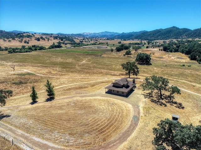 drone / aerial view with a rural view and a mountain view