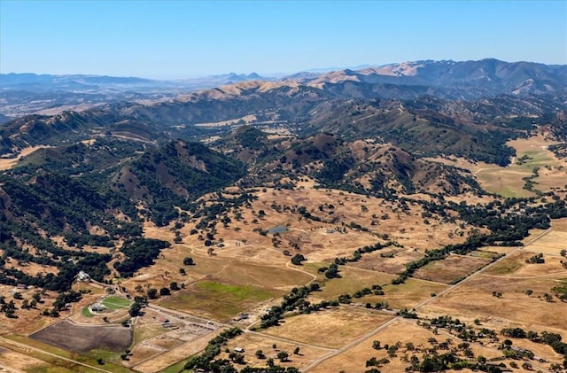 aerial view featuring a mountain view and a rural view
