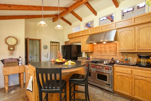 kitchen featuring freestanding refrigerator, wall chimney range hood, double oven range, pendant lighting, and backsplash