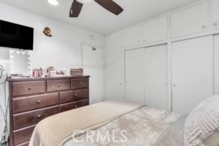 bedroom with a closet and ceiling fan