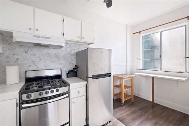 kitchen featuring dark hardwood / wood-style floors, white cabinetry, and stainless steel appliances