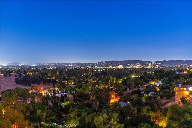 aerial view at dusk with a mountain view