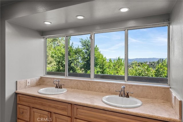 8462 Hillcroft Dr, West Hills, CA 91304 - bathroom with double vanity and recessed lighting