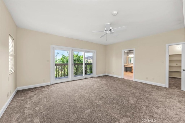 8462 Hillcroft Dr, West Hills, CA 91304 - carpeted empty room with a ceiling fan and a smoke detector