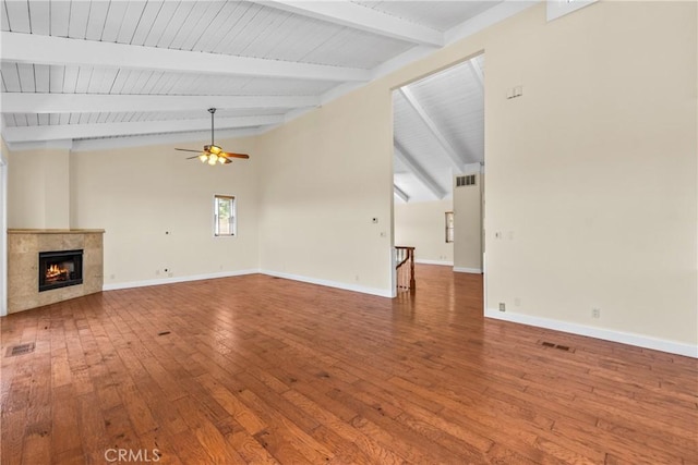8462 Hillcroft Dr, West Hills, CA 91304 - unfurnished living room with wood-type flooring, ceiling fan, a tiled fireplace, and wood ceiling