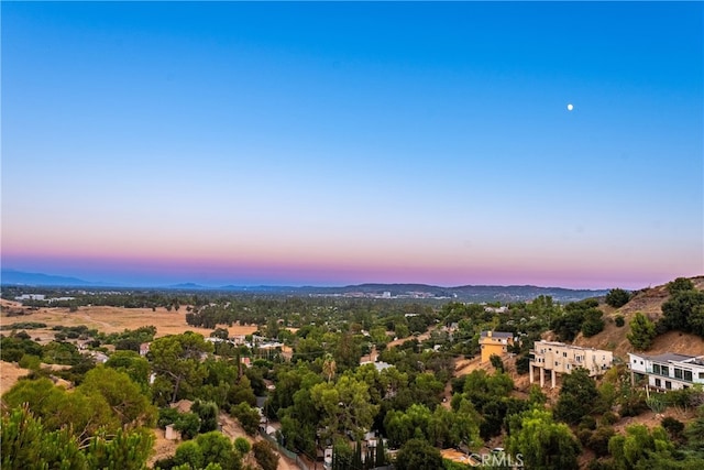 view of aerial view at dusk