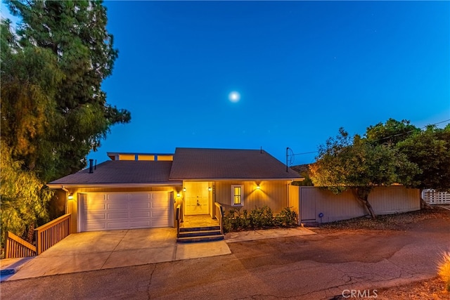 view of front of home featuring a garage