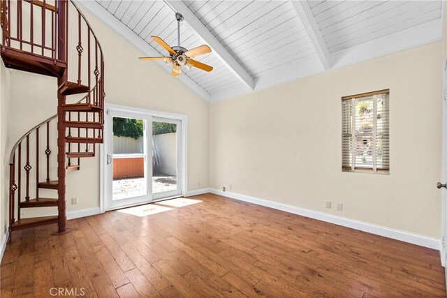 8462 Hillcroft Dr, West Hills, CA 91304 - spare room featuring a ceiling fan, healthy amount of natural light, wood-type flooring, stairs, and high vaulted ceiling