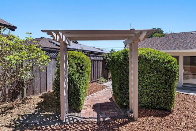 view of yard with a pergola