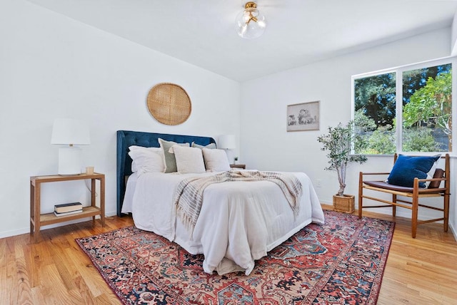 bedroom featuring hardwood / wood-style flooring