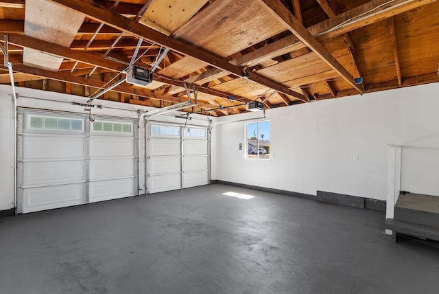 garage featuring a garage door opener