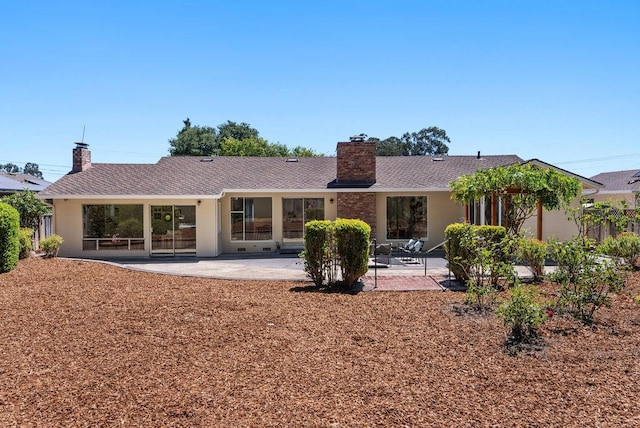 back of house featuring a patio