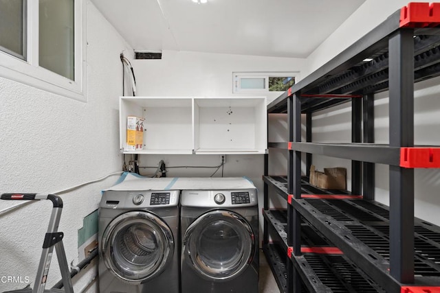 laundry area with washer and dryer