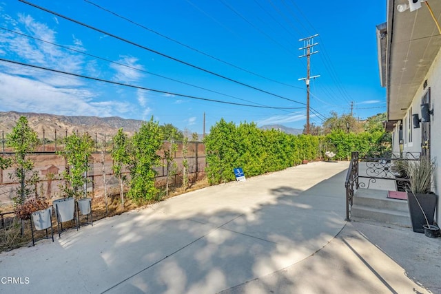 view of patio featuring a mountain view