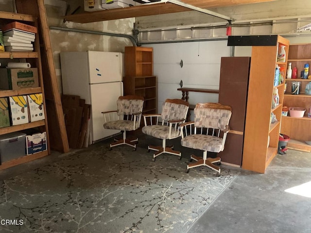 garage featuring white fridge