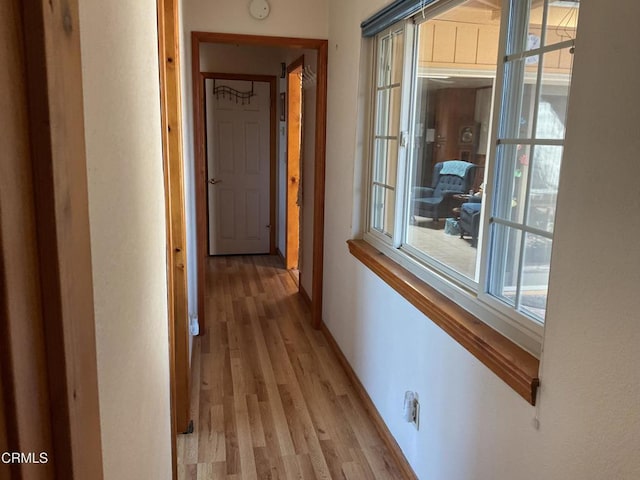 hallway featuring light wood-type flooring