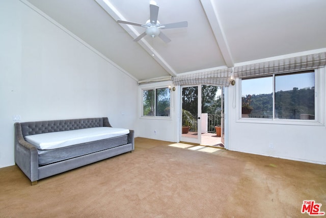 unfurnished room with carpet, vaulted ceiling with beams, ceiling fan, and french doors