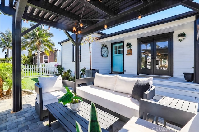 view of patio featuring outdoor lounge area and french doors