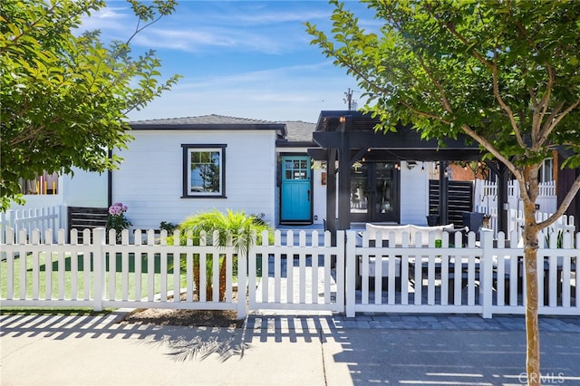 view of front of home with a pergola