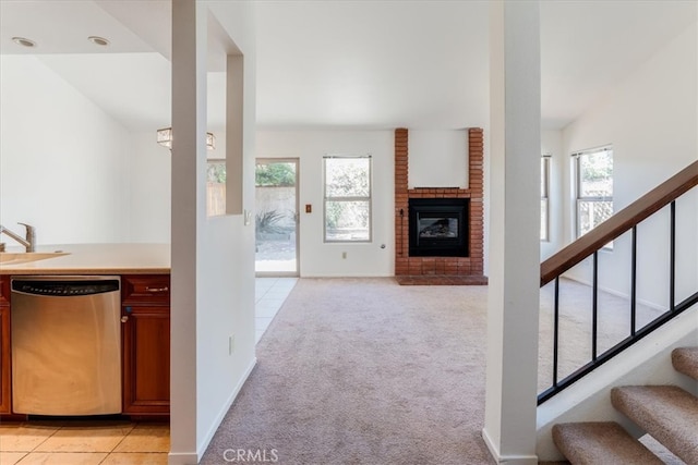 interior space with a brick fireplace and a wealth of natural light