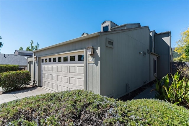 view of home's exterior featuring a garage