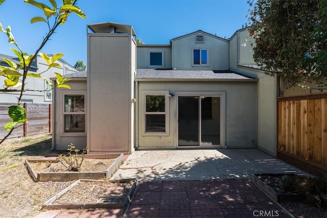 rear view of property with a patio