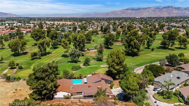 birds eye view of property featuring a mountain view