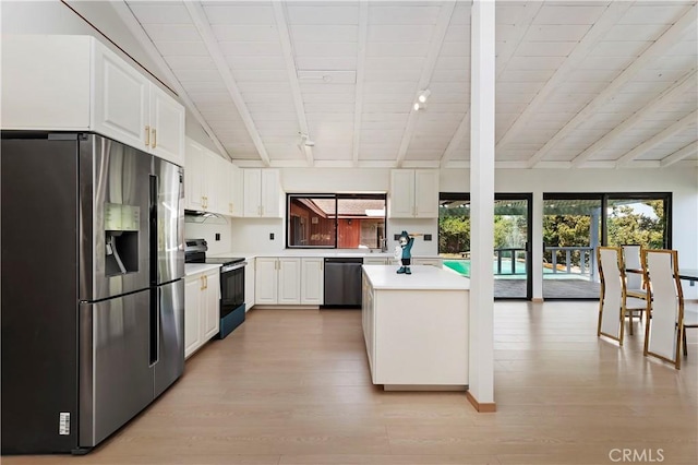 kitchen with white cabinetry, light hardwood / wood-style flooring, rail lighting, and stainless steel appliances