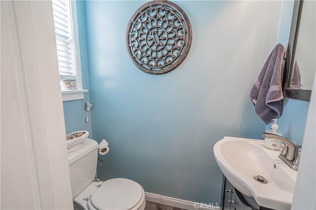 bathroom with sink and toilet