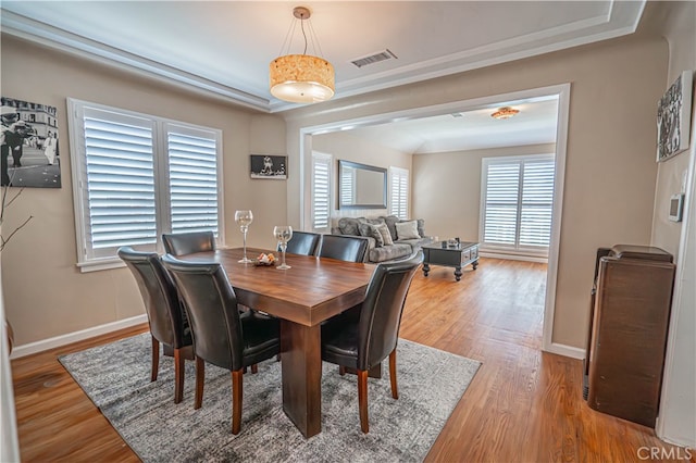 dining space featuring hardwood / wood-style flooring