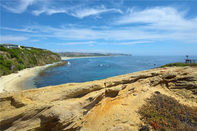 property view of water featuring a beach view