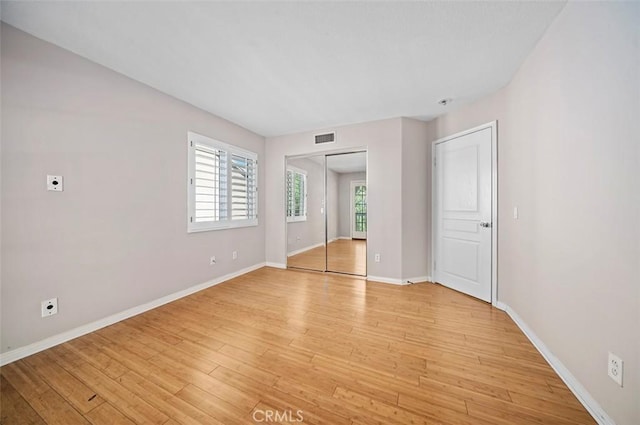 unfurnished bedroom with light hardwood / wood-style floors