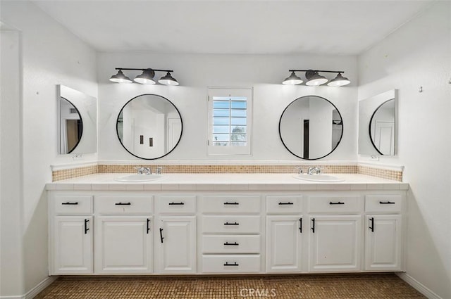 bathroom with vanity and backsplash